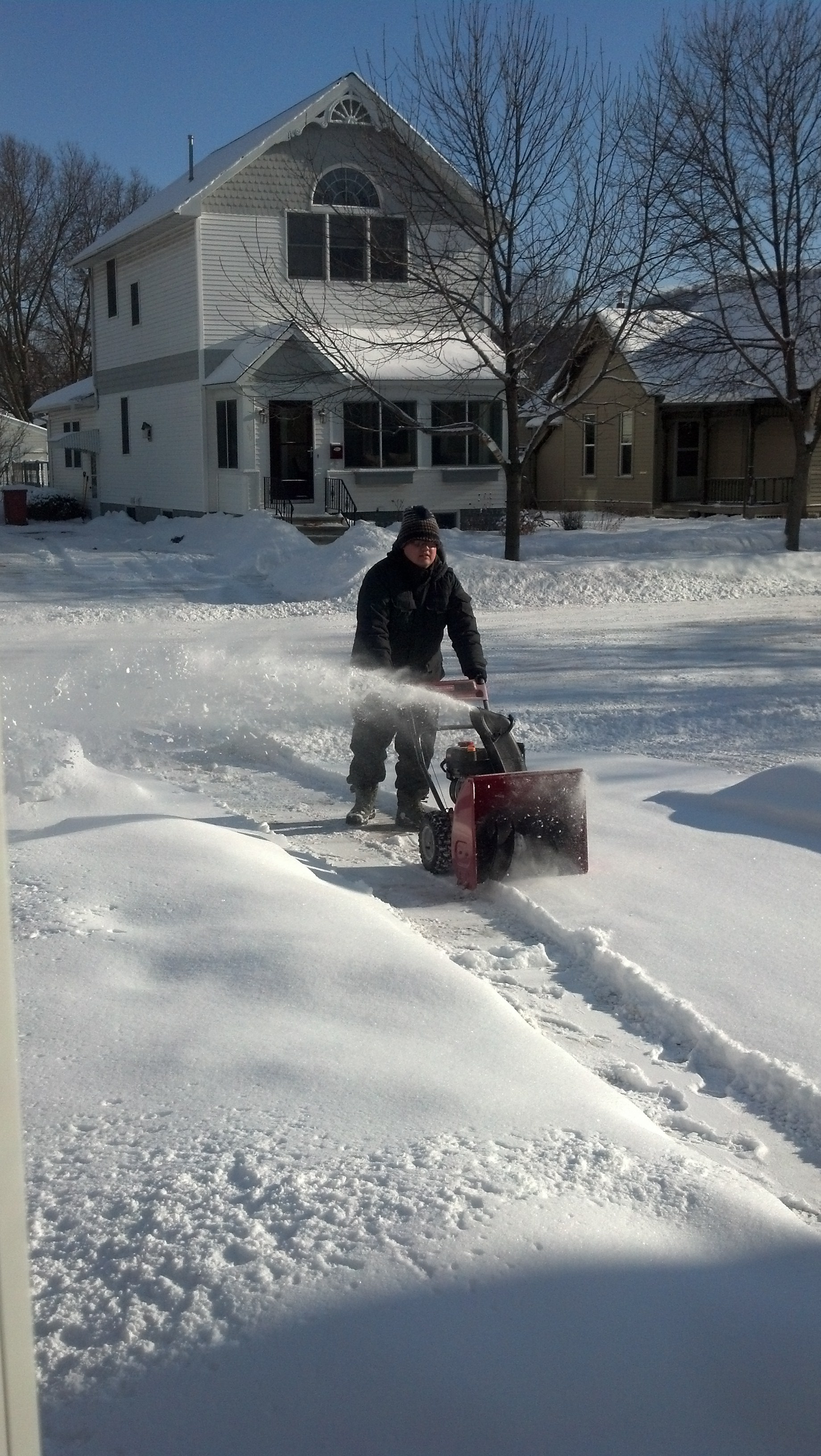 Me pushing a snowblower